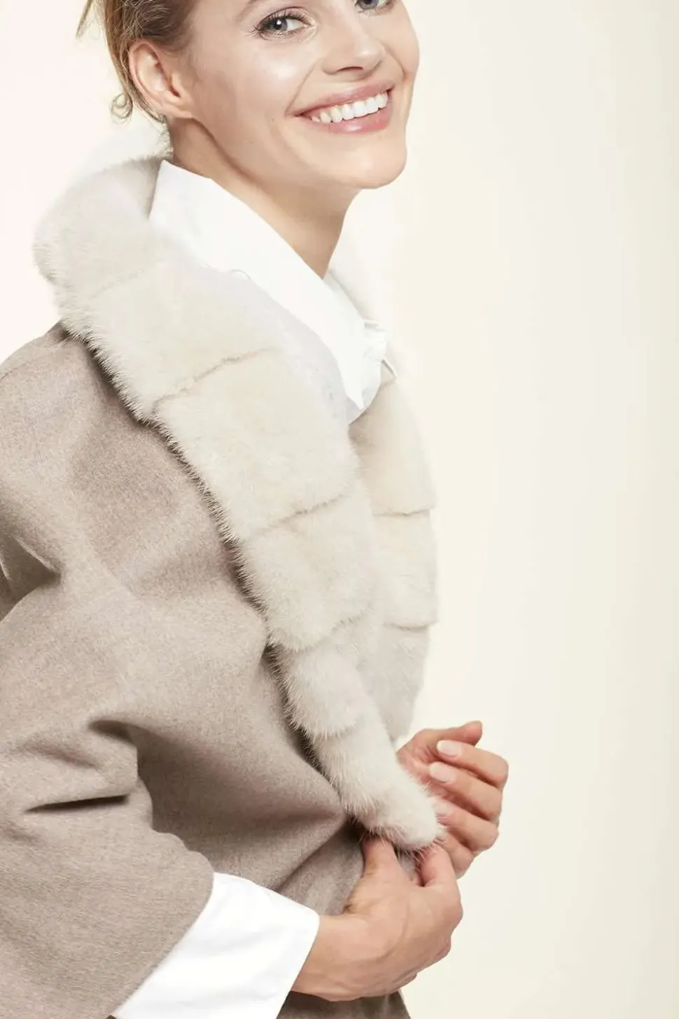 Coat with mink fur collar