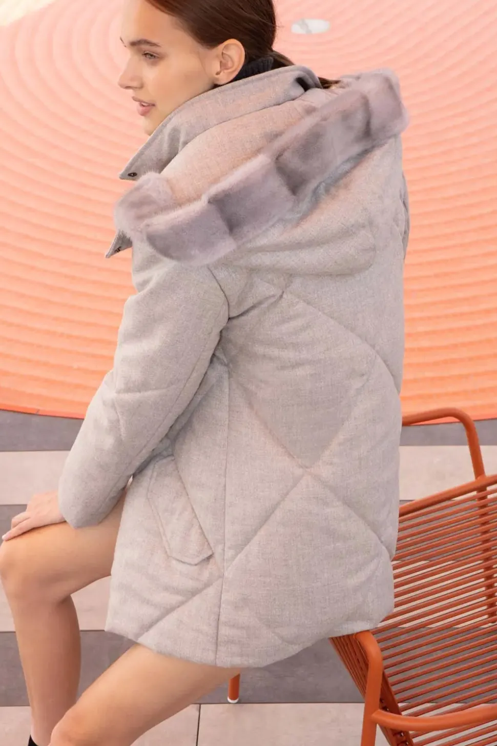 Grey puffer jacket with fur hood