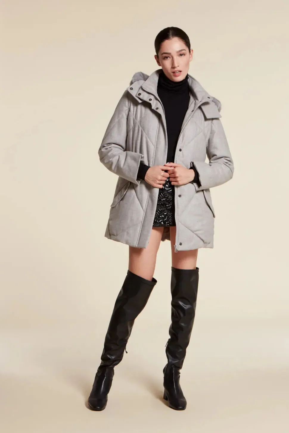 Grey puffer jacket with fur hood