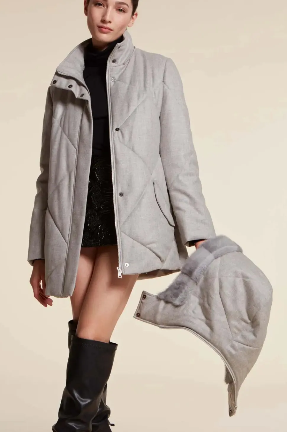 Grey puffer jacket with fur hood