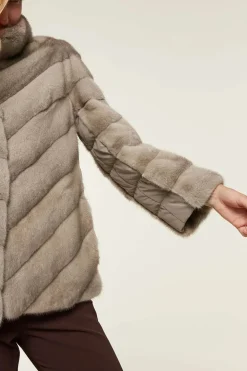 Mink jacket with textile inserts