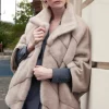 Mink trimmed cape