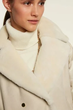 Shearling jacket with down inserts