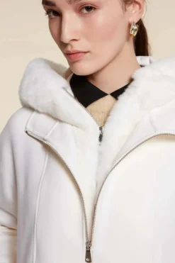 White parka with fur hood