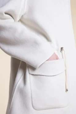 White winter coat with fur hood