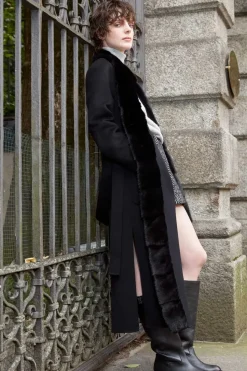 Womens long coat with black fur trimming